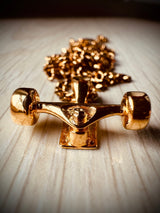 Skateboard Truck w/Wheels Pendant (Gold)