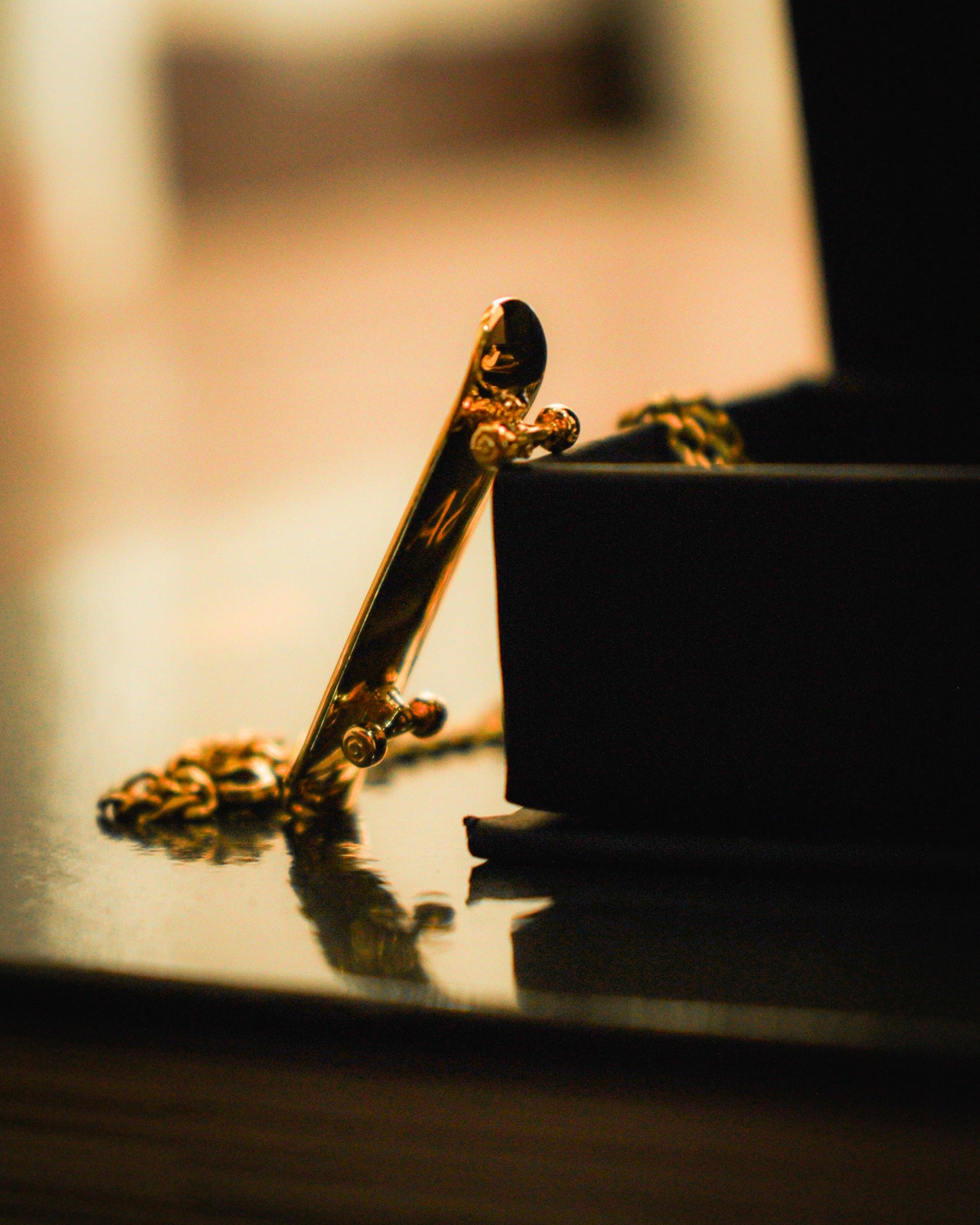Skateboard Pendant (Gold)