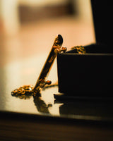 Skateboard Pendant (Gold)