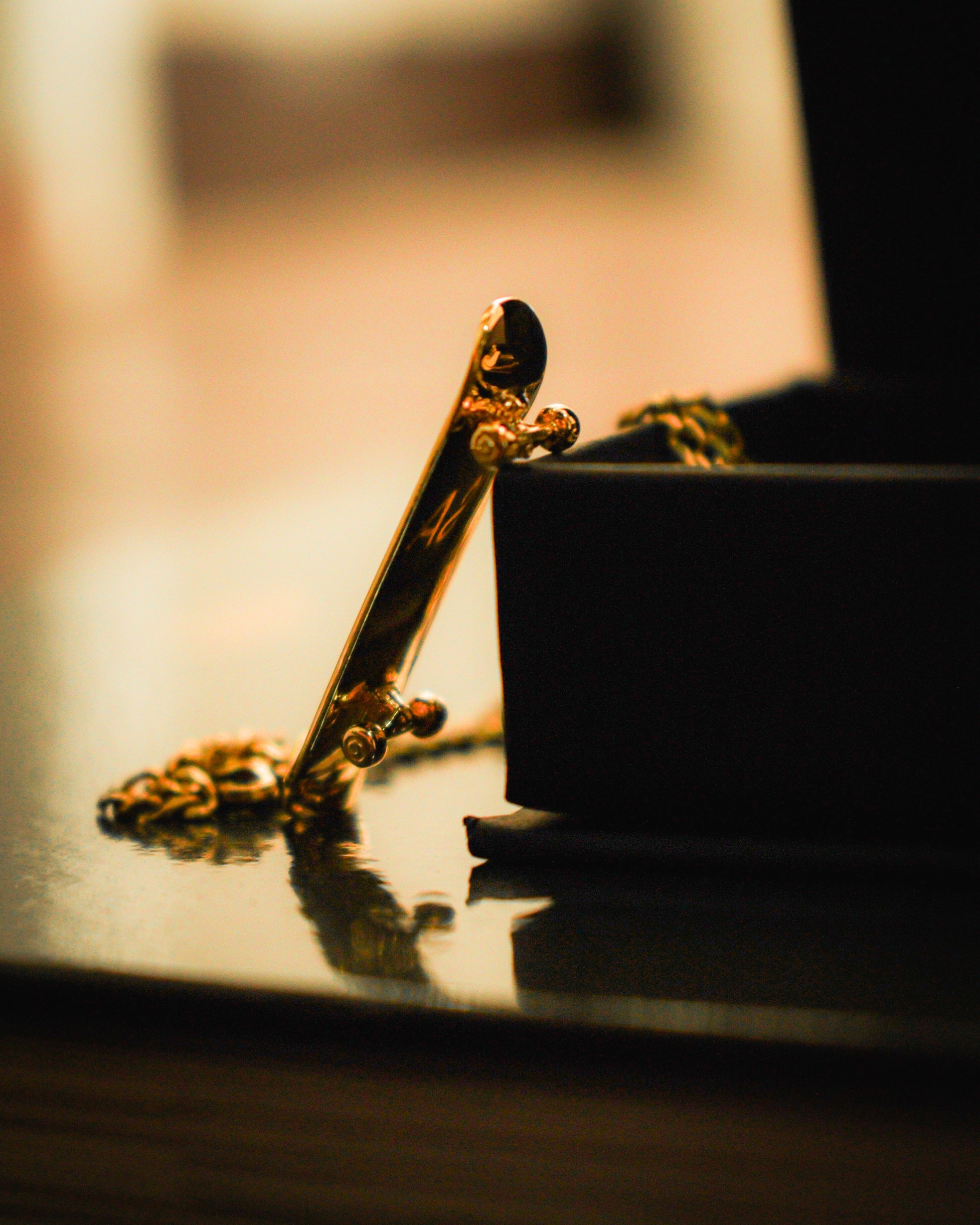 Skateboard Pendant (Gold)