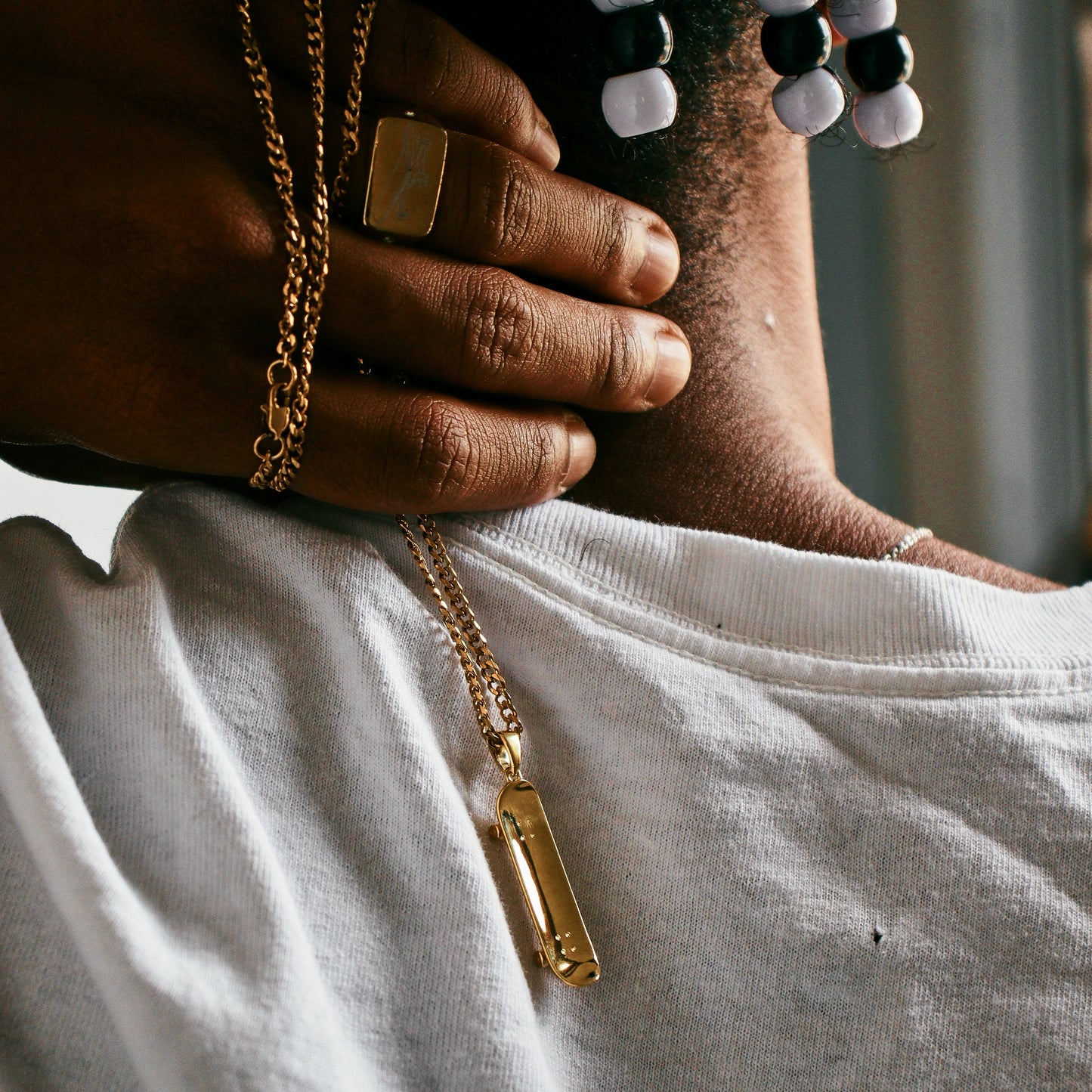 Skateboard Pendant (Gold)